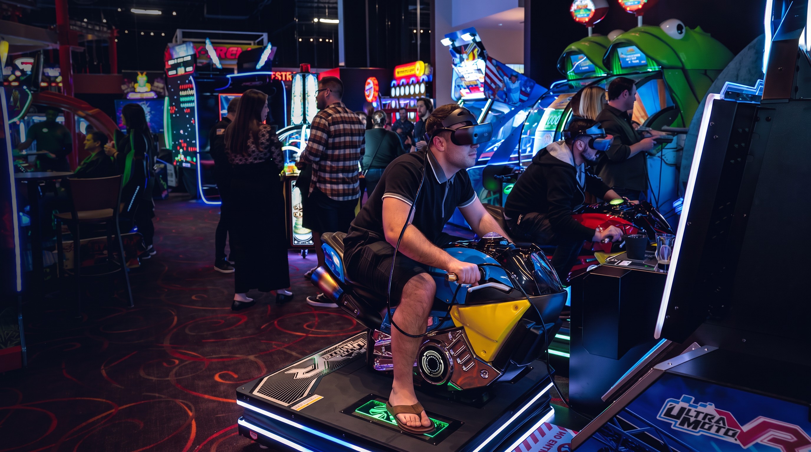 Two players enjoying an immersive VR motion ride on a motorcycle simulator